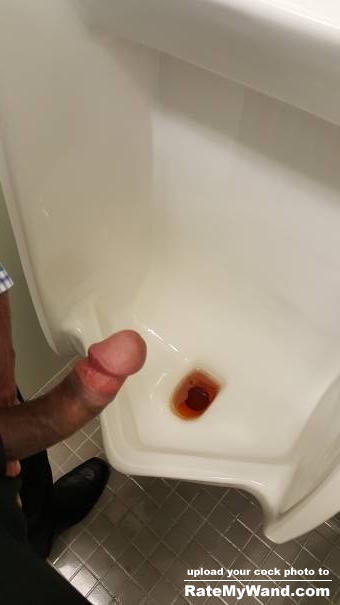 Erect cock at the urinal. Ladies wanna suck? Rate n comment - Rate My Wand